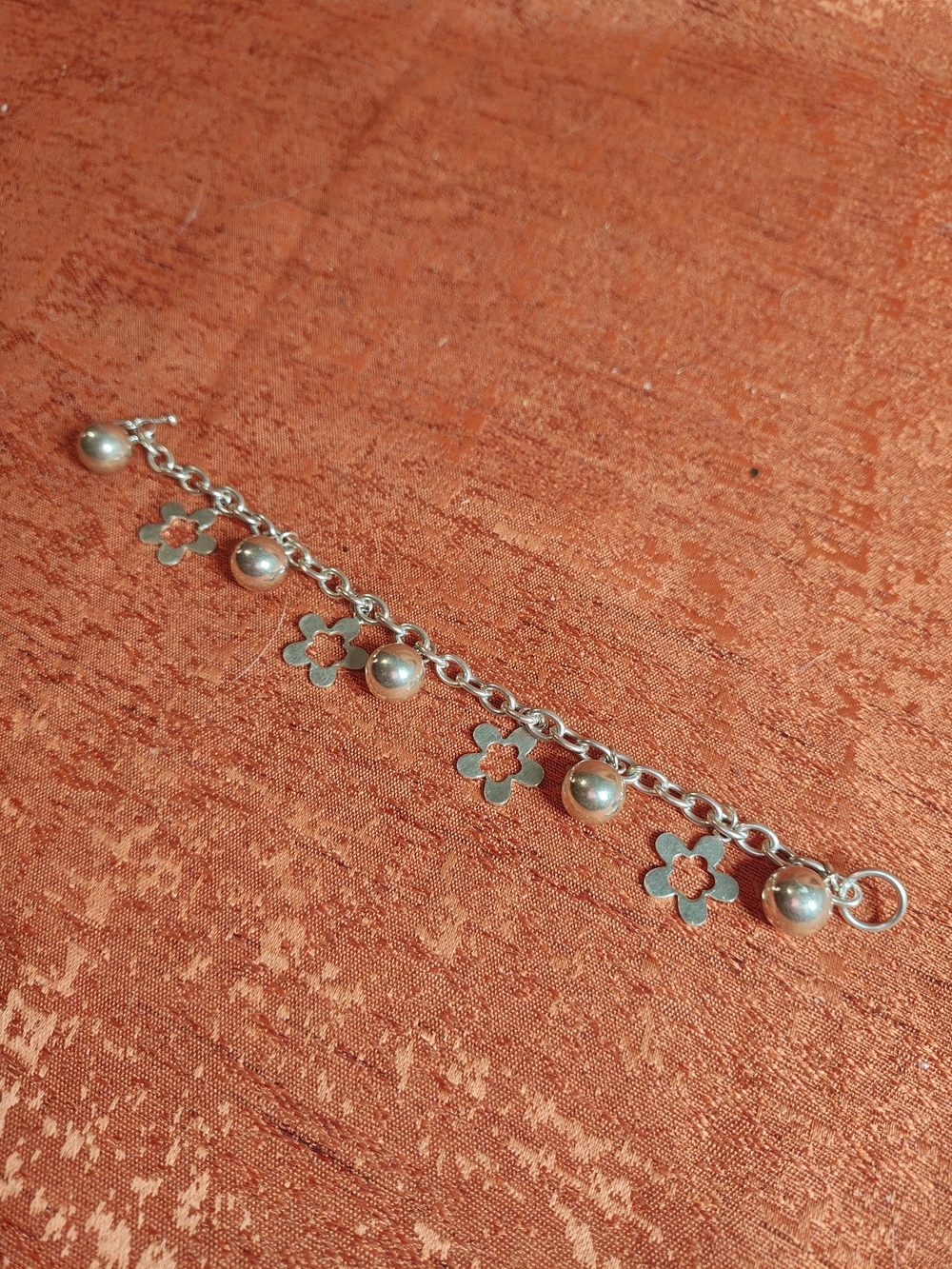 Sterling Silver Flower Charm Bracelet in Silver